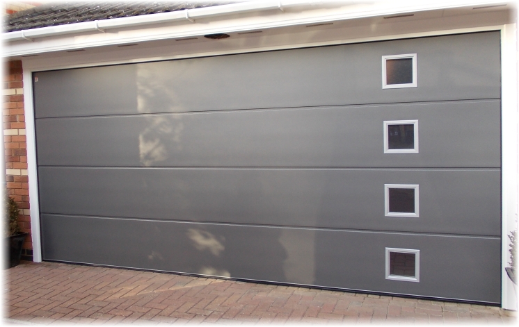a carteck sectional door with square glazing