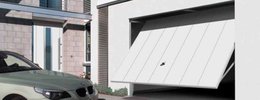 style 984 steel garage door with white entrance door to match colour