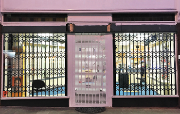Commercial Retractable Security Grilles for Opticians 