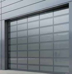 Hormann ALR Vitraplan glass sectional door installed on industrial building