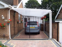 white car port in aluminium