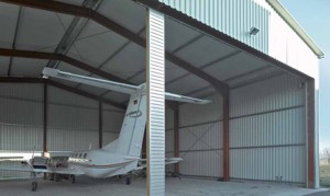 large roller shutter installed on aircraft hangar offering security uniquely constructed to aircraft