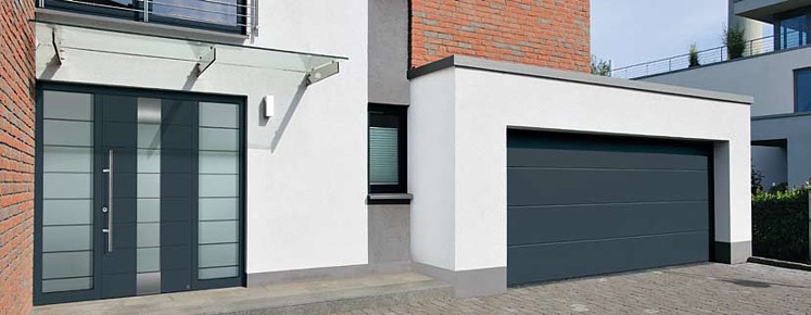 entrance door with side lights and matching garage door