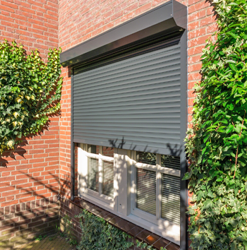 Grey Security Shutter fitted to window