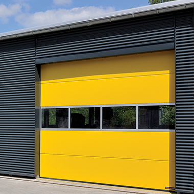 Hormann SPU F42 with strip windows and yellow finish