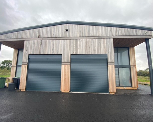 Twin insulated roller doors