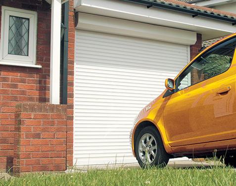 Roller door with external hood