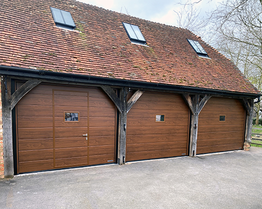 Sectional door with wicket entrance