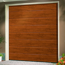 Garador Sectional Door Linear design in Golden Oak